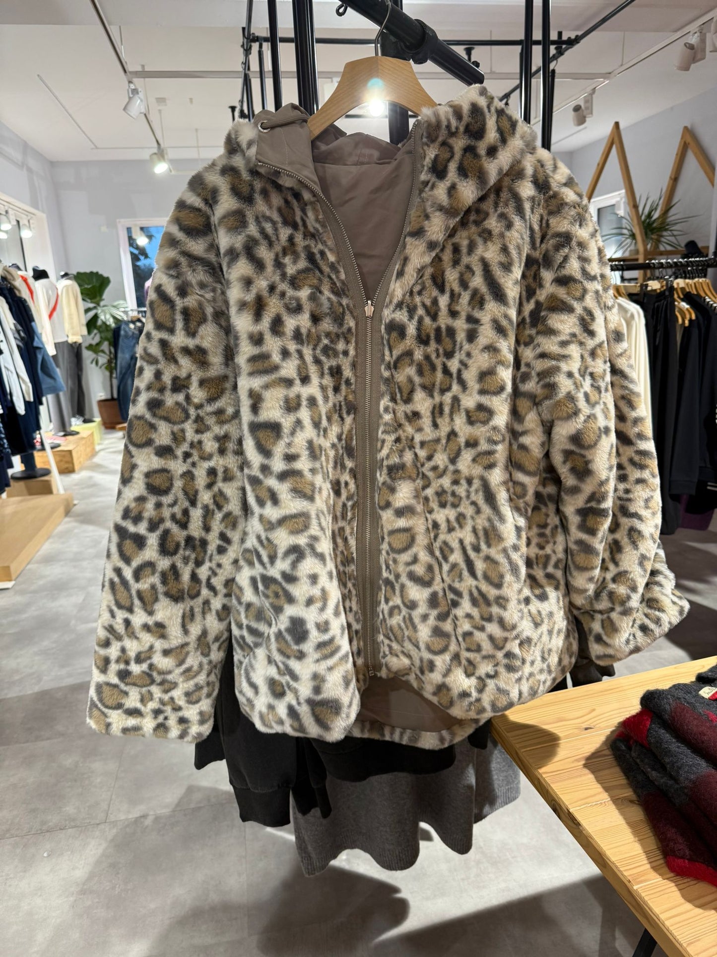 Reversible jacket with hood